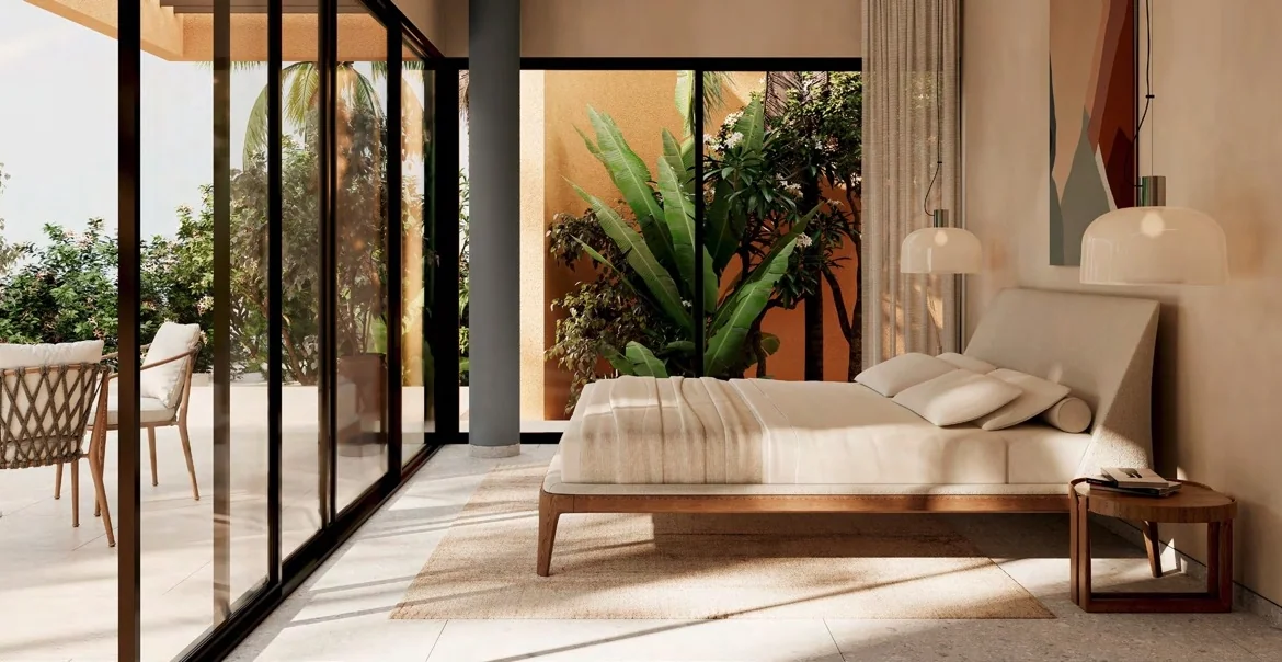 Modern bedroom at Tuban El Gouna with garden views and natural light